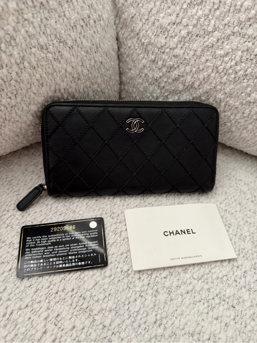 CHANEL Black Quilted Leather Zip Wallet with CC Logo